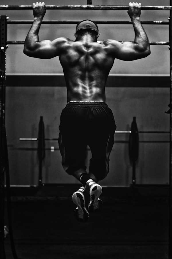 Person using exercise equipment in gym
